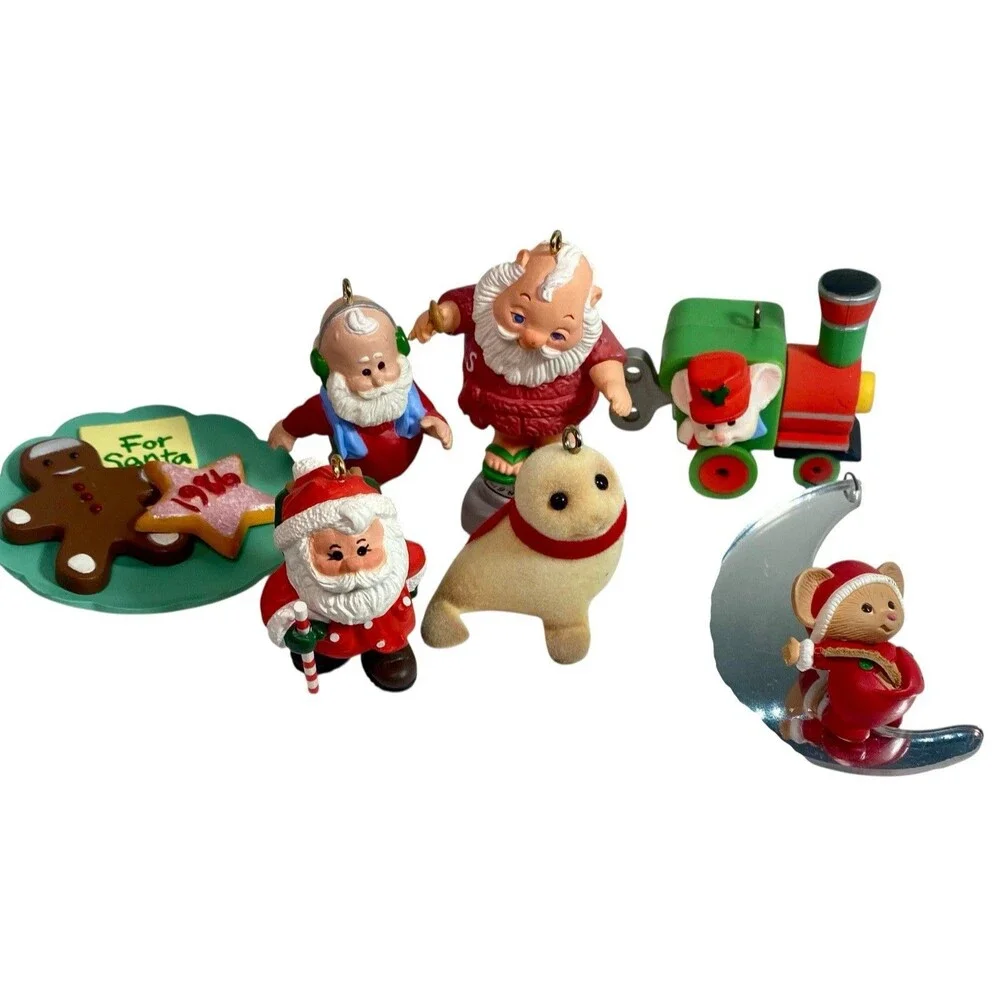 Lot of 7  Hallmark Keepsake Ornaments Vintage 80s Assorted Santa Seal Train